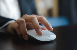 hand on a mouse (ready to click)