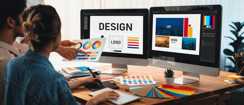 designer creating a logo and color palette on a screen